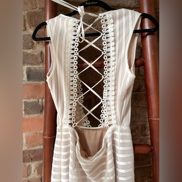 Beautiful White and Cream dress with Cutouts and lace up - Picture 5 of 6